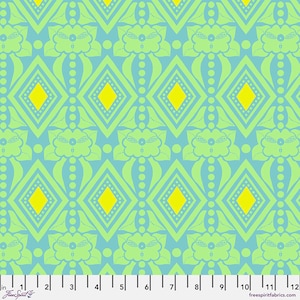 May include: A repeating pattern of green and yellow geometric shapes on a light blue background. The pattern features diamonds, circles, and stylized floral designs.
