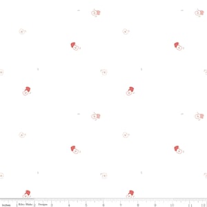 May include: White fabric with a repeating pattern of small pink and white flowers. The flowers are scattered randomly across the fabric.