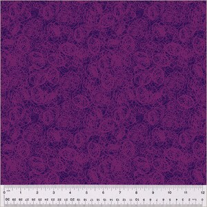 May include: A purple and dark blue fabric with a repeating pattern of pink scribbles and swirls.