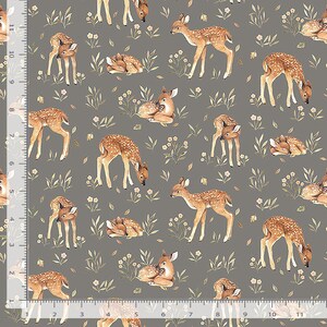 May include: A fabric with a repeating pattern of watercolor-style fawns in various poses, including standing, grazing, and resting. The fawns have brown spots and are set against a gray background with floral and leaf accents. The fabric is measured in inches.