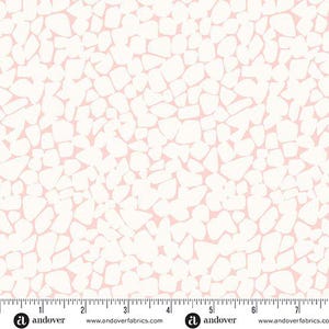 May include: A fabric with a repeating pattern of irregular, off-white shapes against a light pink background. The design resembles a mosaic or a collection of pebbles. The fabric is measured in inches along the bottom edge.