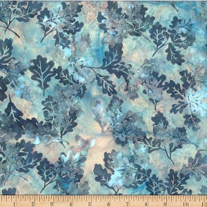 May include: Textile featuring a repeating design of oak leaves and branches in blue and grey hues. The background has a mottled, watercolour-like appearance with hints of beige and blue. Suitable for quilting and crafting projects.