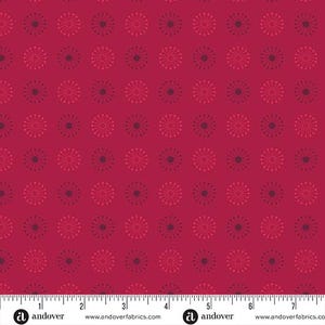 May include: A repeating pattern on a deep red background. The design features floral-like motifs in shades of red and dark purple, evenly spaced across the fabric. This creates a balanced and decorative textile pattern.