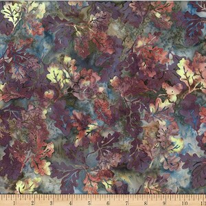 May include: Textile featuring a repeating pattern of oak leaves in shades of purple, red, and yellow. The leaves are layered over a mottled blue and grey background, creating a textured appearance. Suitable for sewing and crafting projects.