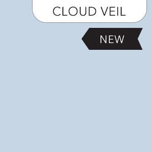 Puede incluir: Un juego de tres tazas de cerámica con acabado moteado y mate. Las tazas son de color crema, gris claro y gris oscuro. Cada taza tiene un diseño simple y minimalista.