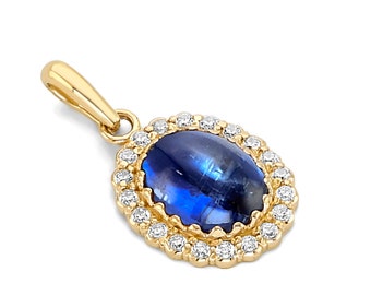 May include: A gold pendant with a blue oval gemstone surrounded by a halo of small diamonds.