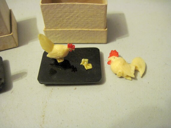 small plastic toy chickens