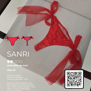 May include: Red lace thong underwear with side tie ribbons. The lingerie features a floral lace design and is size XL. The text "SANRI" is visible in the image.