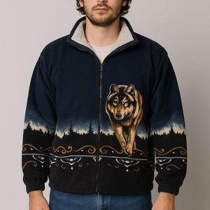 May include: Navy blue fleece jacket with a full-zip closure and a cream-colored fleece lining. The jacket features a detailed graphic of a wolf on the front, with a forest scene at the bottom and on the sleeves. The jacket has a stand-up collar.
