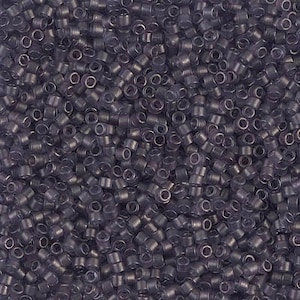 May include: A large quantity of small, opaque, dark purple glass beads. The beads are cylindrical with a hole through the center.