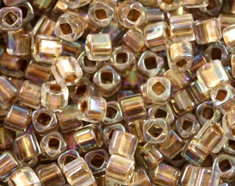 TC-04-994 Gold-Lined Rainbow Crystal - TOHO Cube Beads 4mm