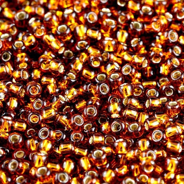 11-34 TOHO 11/0 Round - Silver-Lined Smoky Topaz - TOHO Seed Beads