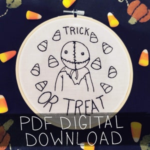 May include: Black and white embroidery pattern of a stitched-up character with the text "Trick or Treat" and candy corn around the character.  PDF Digital Download.