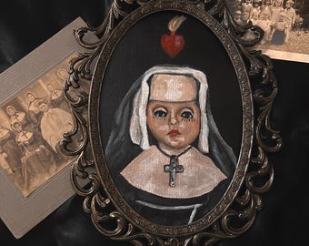 Rareza de la pintura de una muñeca monja antigua
