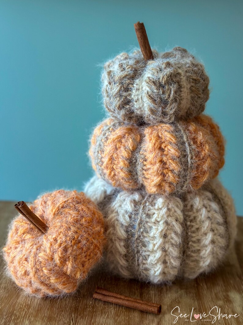 Small, medium, and large crochet pumpkins made with bulky yarn, ribbing, and puff stitch, perfect for Thanksgiving table decor