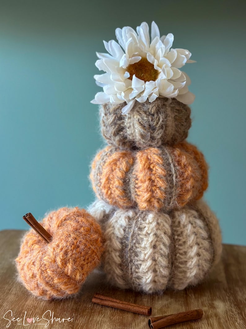 Small, medium, and large crochet pumpkins made with bulky yarn, ribbing, and puff stitch, perfect for Thanksgiving table decor