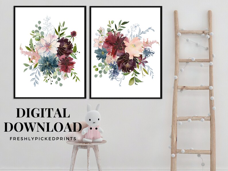 May include: Two framed floral art prints featuring watercolor bouquets in shades of burgundy, blue, and pink, with green foliage. The prints are set against a white background. Text at the bottom reads "DIGITAL DOWNLOAD" and "FRESHLYPICKEDPRINTS".