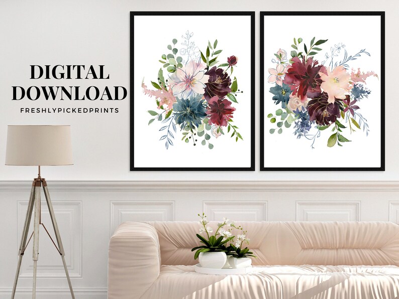 May include: Two framed floral art prints. Each print features a watercolor bouquet with blooms in shades of pink, burgundy, and teal, accented by green foliage. The text "DIGITAL DOWNLOAD" and "FRESHLYPICKEDPRINTS" are visible.