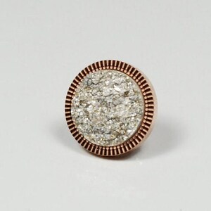 Rose gold earrings with inlaid stones available in various colors. Sold as a pair.