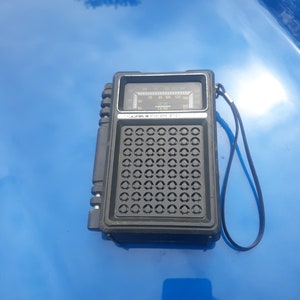 Old vintage Precor AM FM transistor radio