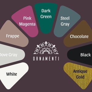 May include: A color wheel with 10 different color swatches, including dark green, pink magenta, steel gray, frappe, dove gray, white, chocolate, black, and antique gold. The word "ORNAMENTI" is in the center of the wheel.