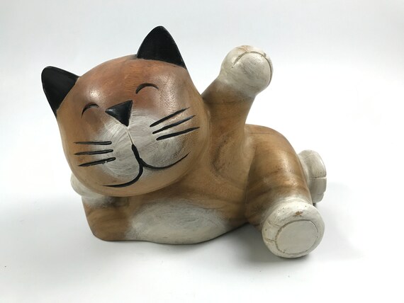 tall wooden carved cats