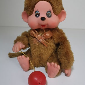 Singe Monchhichi en peluche mécanique vintage extrêmement rare.