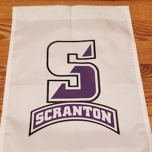 May include: White flag with a purple and black letter "S" and the word "SCRANTON" in a purple arch.