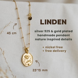 Op de afbeelding: Een vergulde zilveren ketting met een delicate ketting en een hanger met een bloemmotief. De hanger is 23 mm bij 15 mm en de ketting is 45 cm lang. De ketting is nikkelvrij en wordt met gratis verzending geleverd.