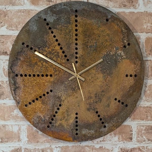 Rusting clock with hour marker holes