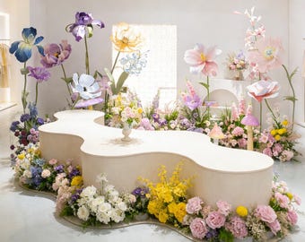 Oversized pastel floral installation, wonderland garden party backdrop, dreamy event decoration