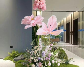Large pink artificial flowers, giant silk flower display, wedding backdrop, event photography decorations