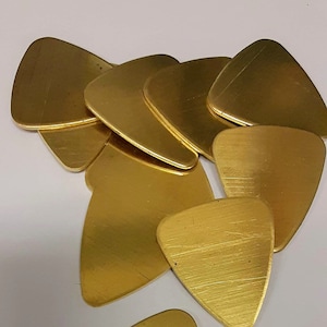 Brass Guitar Picks, 1-1/16 wide by 1-1/4 long by 18 Gauge.