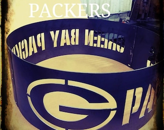 30 inch Green Bay Packers, bolt together fire pit painted high temp black, 12 gauge heavy duty steel. Includes bolts