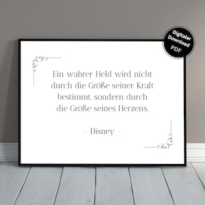 May include: A framed print with a black border. The white interior features a quote in German, attributed to Disney, with decorative flourishes. A digital download PDF label is in the upper right corner.