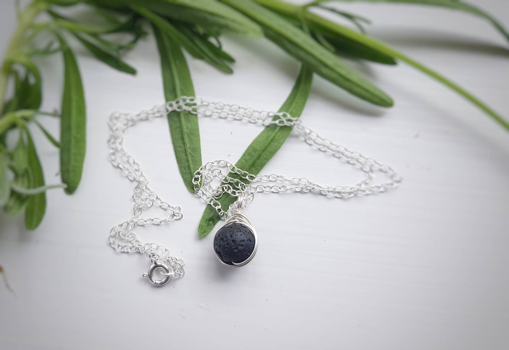 LAVA STONE NECKLACE WITH DOTTED ELEMENTS