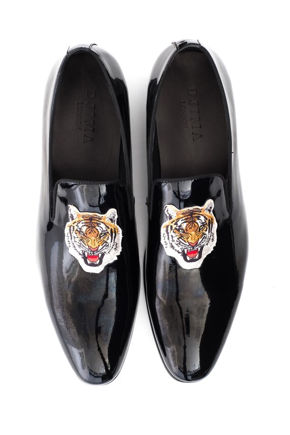 Mocassins en tête de tigre brevet noir pour homme | La Qualité Primacy
Mocassins en tête de tigre brevet noir noir noir pour homme | La Qualité Primacy
d47f89