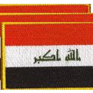 May include: Three embroidered patches featuring the flag of Iraq. Each patch has a rectangular shape with horizontal stripes in red, white, and black. The white stripe contains Arabic text. A gold border surrounds each patch.