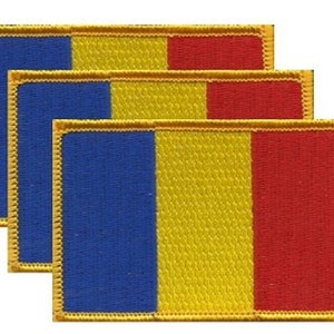 May include: Three rectangular patches featuring the flag of Romania. Each patch has a blue vertical stripe on the left, a yellow stripe in the center, and a red stripe on the right. The edges are bordered with gold thread.