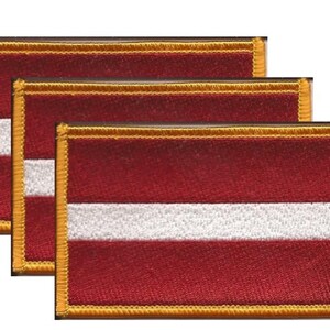 May include: Three rectangular patches featuring the flag of Latvia. Each patch has a burgundy background with a white horizontal stripe and a gold border. The patches are likely embroidered or sewn.