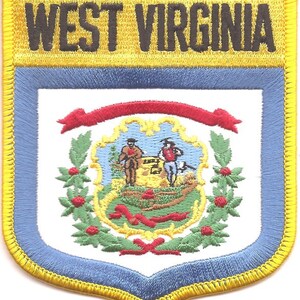 May include: Embroidered patch featuring the words "WEST VIRGINIA" in gold lettering above a shield design. The shield has a blue border, a white center with a state seal, and a gold border. The state seal depicts two men and a landscape.
