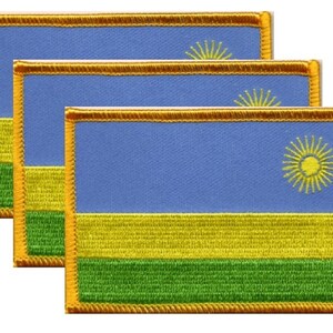 May include: Three embroidered patches featuring the flag of Rwanda. Each patch has a blue upper section, a yellow middle section, and a green lower section. A yellow sun design is in the blue section. The patches are rectangular with a gold border.
