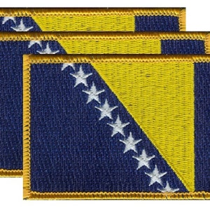 May include: Three embroidered patches featuring the flag of Bosnia and Herzegovina. The flag design includes a blue field with a yellow triangle and white stars. Each patch has a gold border.
