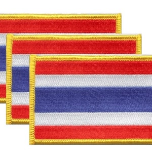 May include: Three rectangular embroidered patches featuring the flag of Thailand. Each patch has a red stripe at the top and bottom, a blue stripe in the middle, and a white stripe in between. The patches have a gold border.