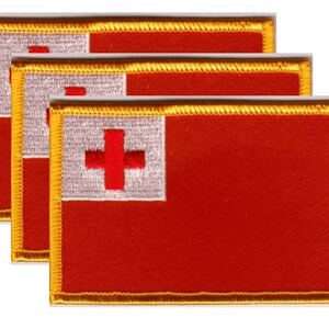 May include: Three rectangular patches featuring the flag of Tonga. Each patch has a red background with a white canton bearing a red cross. The patches are bordered with gold thread.