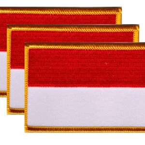May include: Three rectangular patches featuring the flag of Indonesia. Each patch has a red upper half and a white lower half, with a gold border. The patches are arranged in a slightly overlapping pattern.