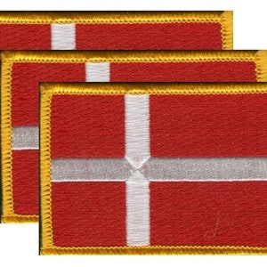 May include: Three rectangular patches featuring the flag of Denmark. Each patch has a red background with a white Nordic cross. The edges are trimmed with gold thread.