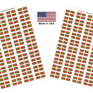 May include: Two sheets of stickers featuring the Basque flag, with red, green, and white designs. The stickers are arranged in a grid pattern. An American flag and the text "Made in USA" are also visible.
