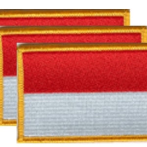 May include: Three rectangular patches featuring the Indonesian flag design. Each patch has a red upper half and a white lower half, with a gold border. The patches are embroidered.