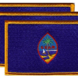 May include: Three Guam flag patches. Each patch is rectangular with a blue background and a gold border. The Guam seal is in the center, featuring a palm tree, sailboat, and the word "GUAM".